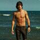 Man in Army Pants Walking Out of the Sea Water... (thumbnail)