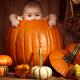 Little Baby Boy Sitting Inside a Large Pumpkin... (thumbnail)