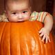 Little Baby Boy Sitting Inside a Large Pumpkin... (thumbnail)