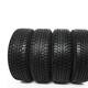 Set of four winter tires isolated on white background... (thumbnail)
