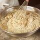 Baker Whisking Batter... (thumbnail)
