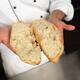 Baker with a Freshly Baked Bread in His Hands... (thumbnail)