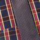 Closeup of a tartan shirt with a tie... (thumbnail)
