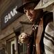 Cowboy Smoking a Cigar Outside of a Bank Building... (thumbnail)