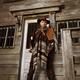 Cowboy Standing Outside of a Bank Building Notorious villain and robbe... (thumbnail)