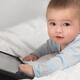 Baby Boy Playing with Tablet Computer... (thumbnail)