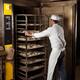 Baker Rolling in a Rack Trolley in the Oven... (thumbnail)