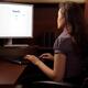 Woman Sitting in Front of a Computer... (thumbnail)