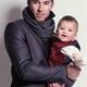 Young Man with a Baby Boy in His Hands... (thumbnail)