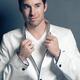 Young Man Wearing White Blazer... (thumbnail)