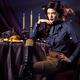 Beautiful Woman Sitting at a Festive Table... (thumbnail)
