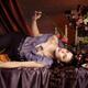 Beautiful Woman Lying on a Festive Table... (thumbnail)