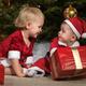 Kids with Gifts under a Christmas Tree... (thumbnail)