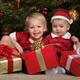 Kids with Gifts under a Christmas Tree... (thumbnail)