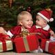 Kids with Gifts under a Christmas Tree... (thumbnail)