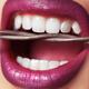 Closeup of Woman's Mouth Biting on Barbed Wire... (thumbnail)