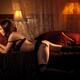 Sexy Young Woman Lying on a Bed... (thumbnail)