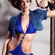 Young Woman in Blue Swimsuit and Fur Vest... (thumbnail)