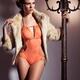 Young Woman in Swimsuit and Fur Jacket... (thumbnail)