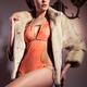 Young Woman in Swimsuit and Fur Jacket... (thumbnail)