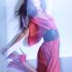 Fashion Photo of Woman in Red Dress Jumping in Blue Light... (thumbnail)