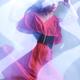 Artistic Fashion Photo of Woman in Shining Blue Light Wearing Red Dres... (thumbnail)