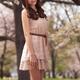 Young Smiling Woman in a Park... (thumbnail)