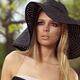 Beautiful Young Woman in Sunhat... (thumbnail)