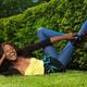Laughing Young Woman Lying on the Grass... (thumbnail)