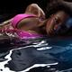 Woman in Swimsuit Lying in Water... (thumbnail)