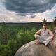 Young Man Meditating in the Nature... (thumbnail)