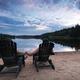 Couple Sitting in Chairs at the Lake... (thumbnail)