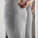 Woman Putting On a Skirt... (thumbnail)