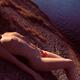 Nude Woman Lying on Rocks by the Water... (thumbnail)