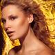 Beautiful Woman with Flying Golden Hair... (thumbnail)