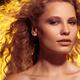 Beautiful Woman with Flying Golden Hair... (thumbnail)