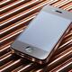 Apple iPhone 4 Smartphone on Shiny Red Metal... (thumbnail)