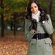Woman Wearing a Green Coat in Fall... (thumbnail)