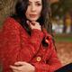 Woman Cuddling in a Sweater in Fall... (thumbnail)