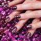 Closeup of Woman Hands With Purple Nail Polish... (thumbnail)