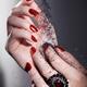 Black Sand Falling on Woman Hands... (thumbnail)