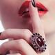 Woman Holding Index Finger to Her Lips... (thumbnail)