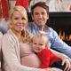 Happy family together at home on Christmas eve... (thumbnail)