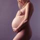 Beautiful nude pregnant woman studio portrait... (thumbnail)