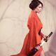 Beautiful asian woman warrior in red kimono with katana sword... (thumbnail)