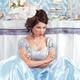 Woman sitting pouting beside a party table... (thumbnail)