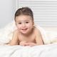 Cute two year old baby boy under a blanket... (thumbnail)