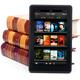 Amazon Kindle Fire leaning against books... (thumbnail)
