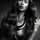 Beautiful woman with long hair wearing jewellery black and white... (thumbnail)