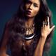 Beautiful woman with long hair wearing jewelry... (thumbnail)